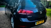 Back view angled Volkswagen Golf 2017 black